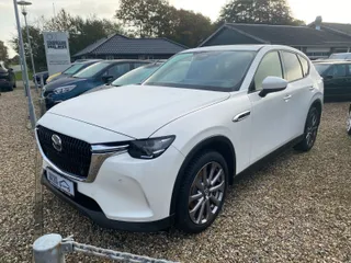 Hvid Mazda CX-60 PHEV Exclusive-Line aut. AWD 2,5 Benzin, set skråt forfra